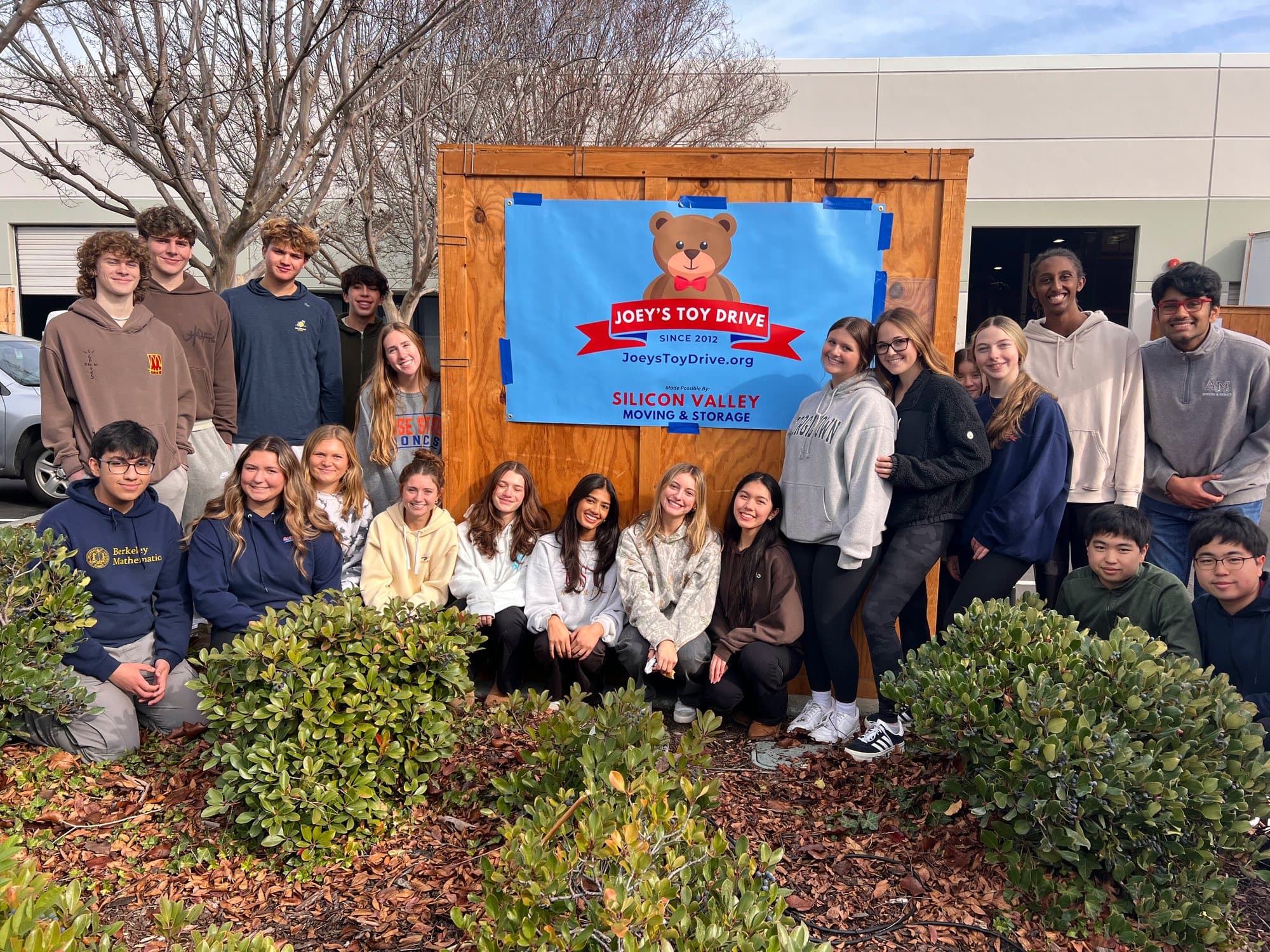 Student volunteers gathered for a community toy drive